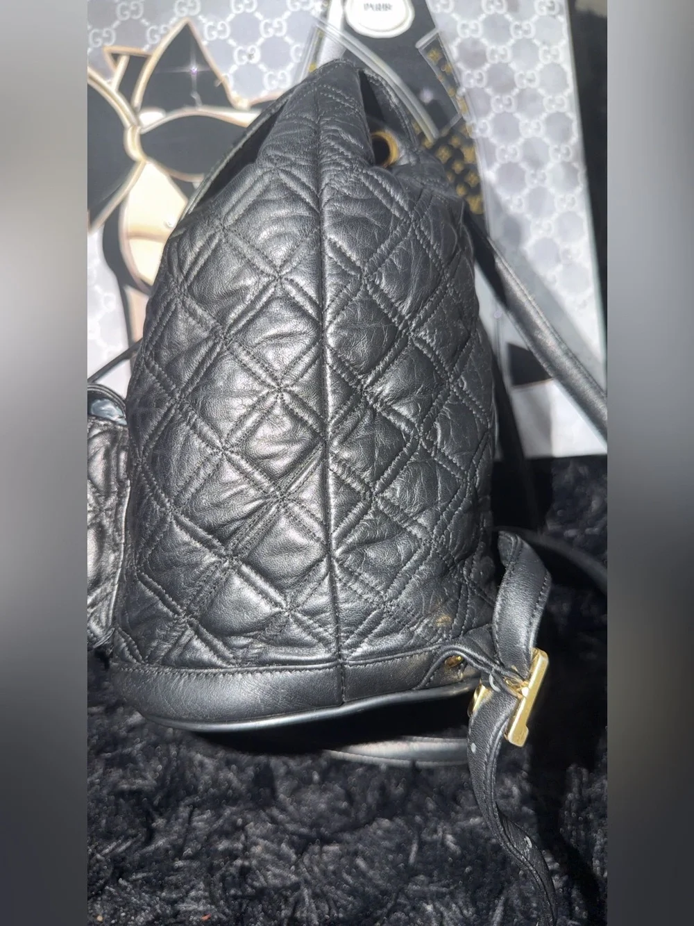 MCM Black Quilted Leather Backpack with Gold Hardware Accents